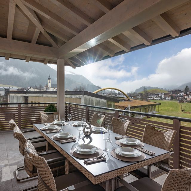 Penthouse terrace with a view of the Tyrolean mountain